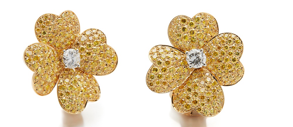 A pair of diamond and coloured diamond 'Cosmos' earrings, by Van Cleef & Arpels